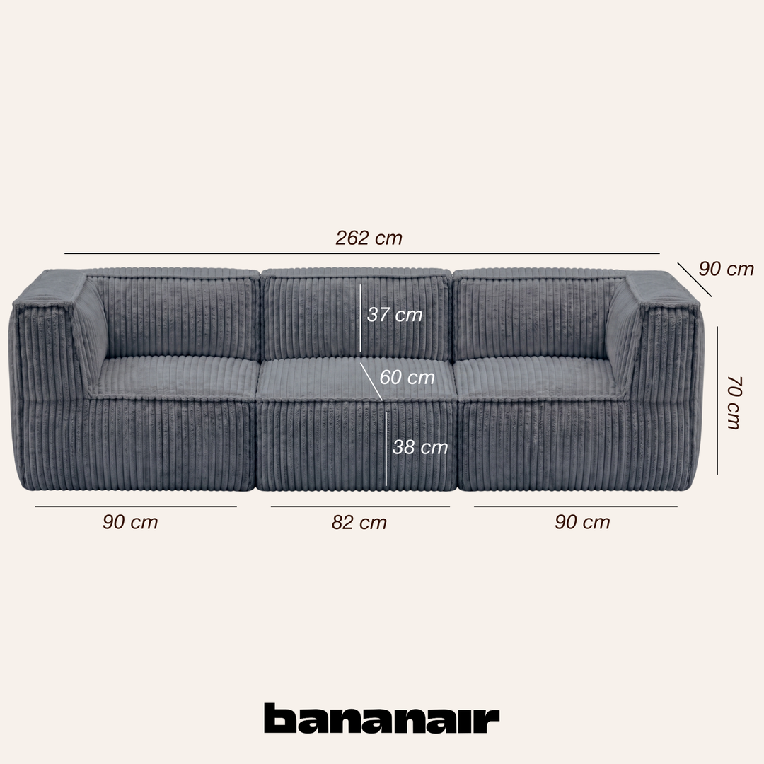 Canapé modulable 3 places déhoussable en velours côtelé gris foncé avec dimensions 90 x 262 cm indiquées