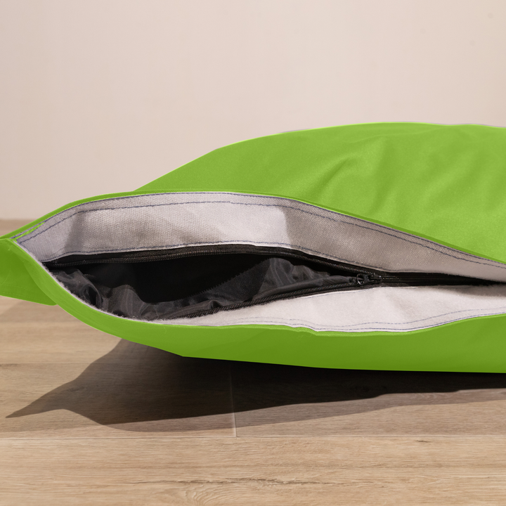 Détail de la housse amovible du pouf extérieur déhoussable 140x180 cm avec fermeture éclair.