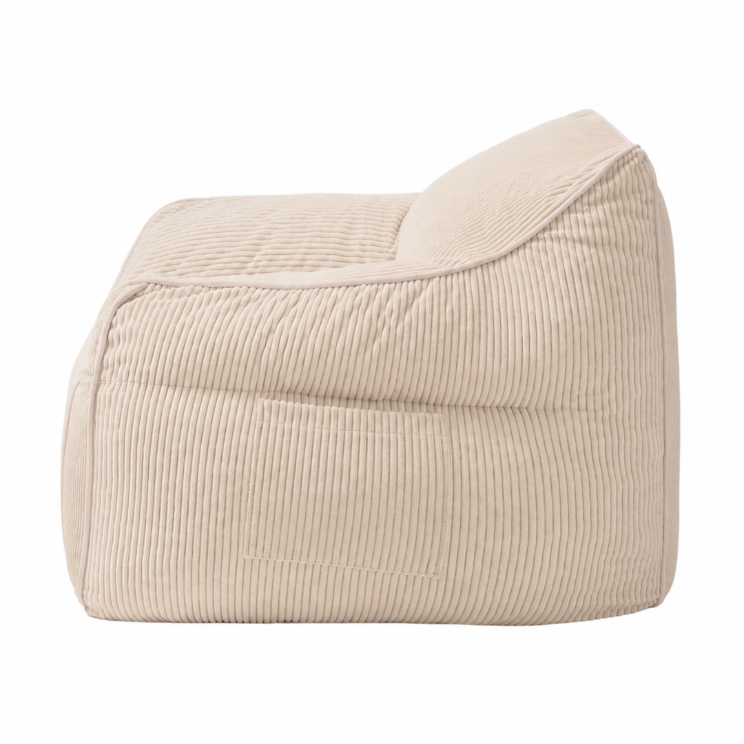 Fauteuil-pouf enfant en velours côtelé beige, vue de profil
