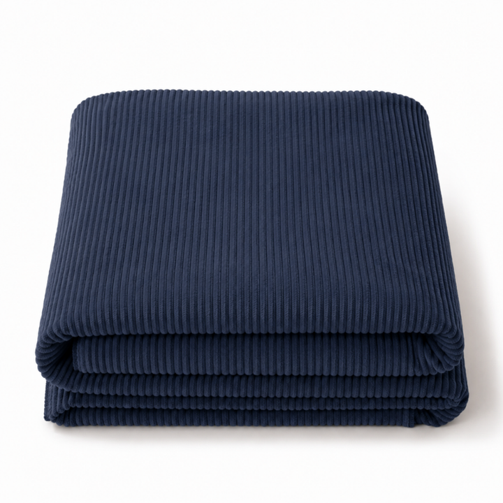Housse de futon 140x190 cm en velours côtelé bleu foncé, pliée