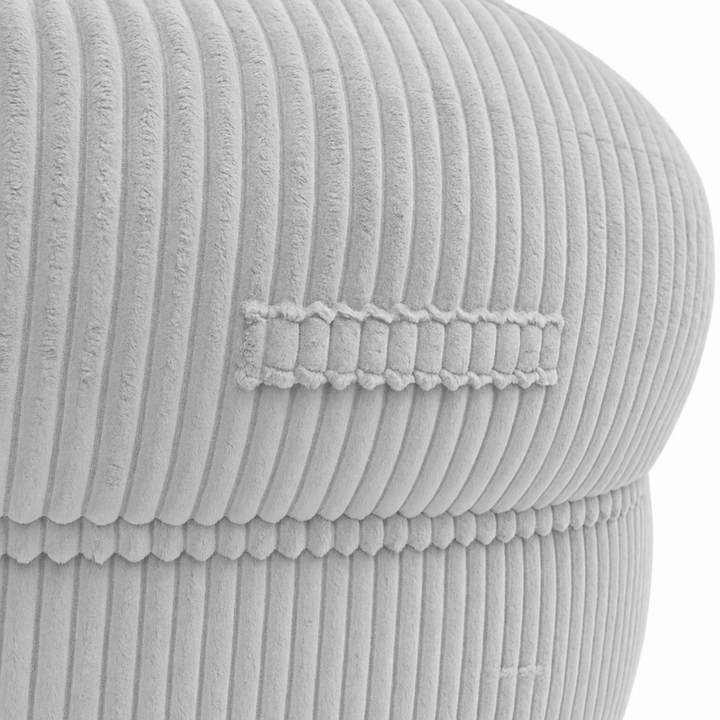Gros plan sur la poignée du pouf XXL, tissu en velours côtelé.