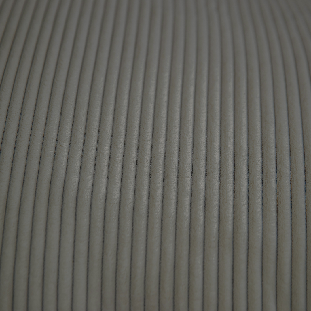 Détail du velours côtelé du pouf déhoussable, gris foncé, reliefs réguliers.