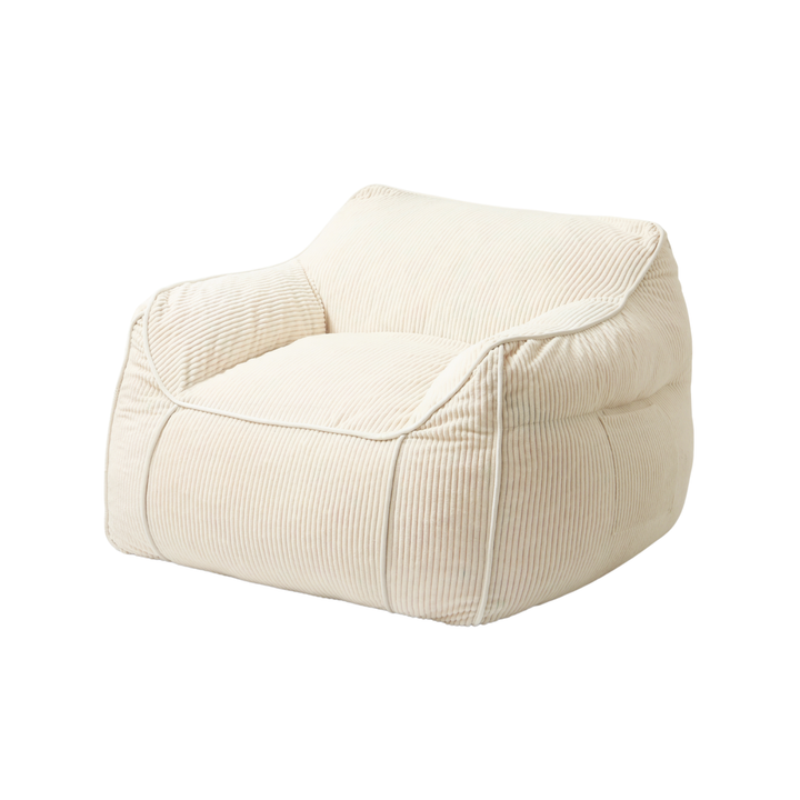 Fauteuil pouf enfant en velours côtelé blanc cassé, structure rembourrée, coutures visibles